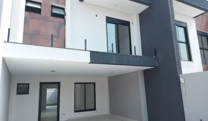 Sobrado estilo moderno, frente para a rua, 3 suítes, 1 vaga coberta