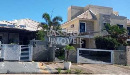 Casa em condomínio fechado com 3 quartos à venda na Rua do Ipê da Várzea, 84, Cachoeira do Bom Jesus, Florianópolis por R$ 1.400.000