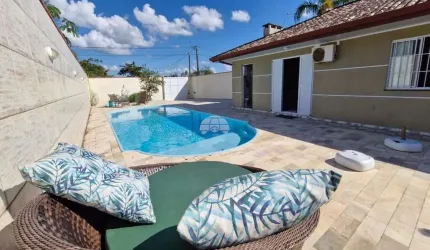 Casa com 4 quartos à venda na Avenida Alvorada Do Sul, 489, Coroados, Guaratuba, 271 m2 por R$ 699.000