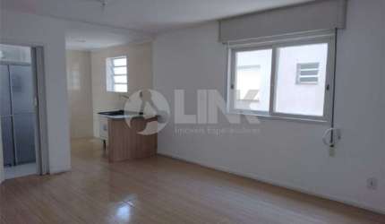 Apartamento 1 dormitório com 1 vaga de garagem à venda no bairro Santo Antônio em Porto Alegre