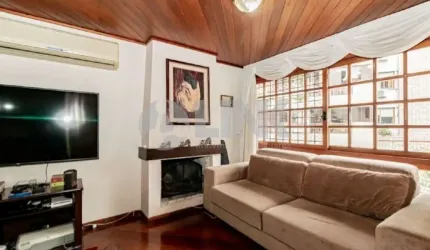 Casa em condomínio com 3 quartos e 2 vagas à venda no bairro Bela Vista em Porto Alegre