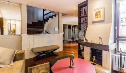Casa em condomínio com 4 quartos e 2 vagas de garagem à venda no bairro Boa Vista em Porto Alegre