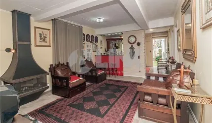 Casa de 7 quartos com 4 vagas à venda no bairro Chácara das Pedras em Porto Alegre