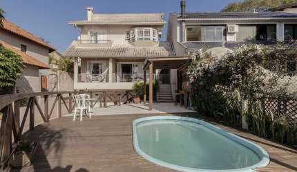 Casa com 3 quartos à venda na Rua Charruas, 267, Espírito Santo, Porto Alegre por R$ 1.267.000