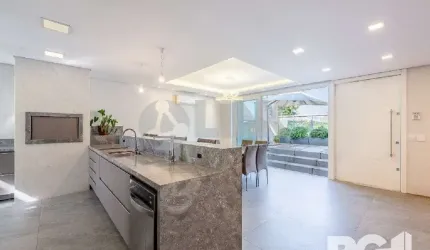 Casa alto padrão 3 dormitórios 3 suítes e 3 vagas à venda no bairro Três Figueiras em Porto Alegre