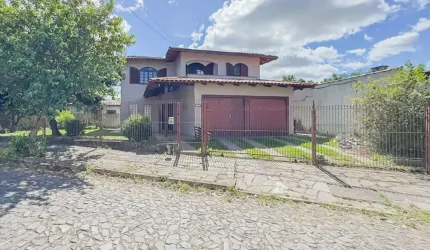 Casa com 5 quartos à venda na Rua Vicente Celestino, 430, Parque Dos Maias, Porto Alegre por R$ 597.000