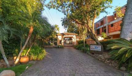 Casa em condomínio fechado com 3 quartos à venda na Avenida Otto Niemeyer, 77, Tristeza, Porto Alegre por R$ 1.990.000