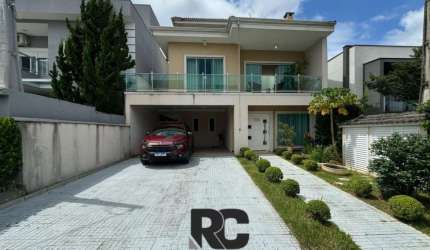 Casa com 4 dormitórios à venda, 260 m² por R$ 1.700.000,00 - Aruã - Mogi das Cruzes/SP