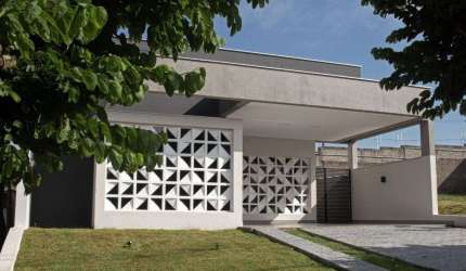 Casa com 3 dormitórios à venda, 140 m² por R$ 1.100.000,00 - Condomínio Parque Tauá - Araçari