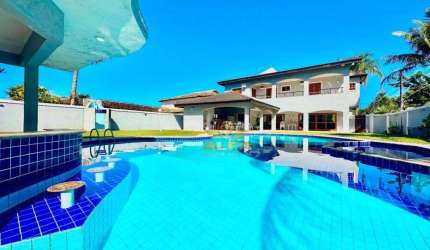 Casa à venda com 5 suítes - Piscina e churrasqueira - Condomínio com segurança e lazer - Jardim Acapulco - Guarujá/SP