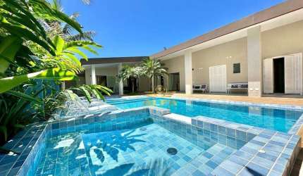 Casa com 6 suítes à venda, Mobiliada e decorada, Condomínio Jardim Acapulco Guarujá.