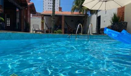Linda Casa Alto Padrão Térrea - Com Piscina e Churrasqueira - 100 mts do mar!!