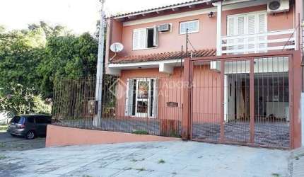 Casa com 3 quartos à venda na Rua Doutor Luiz da Silva Flores, 16, Teresópolis, Porto Alegre, 100 m2 por R$ 580.000