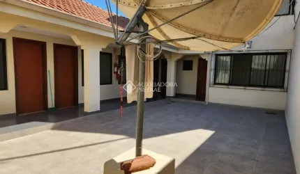 Casa comercial com 9 quartos à venda na Rua Corrêa Lima, 1831, Santa Tereza, Porto Alegre, 605 m2 por R$ 1.200.000