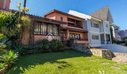 Casa em condomínio fechado com 3 quartos à venda na Rua Tocantins, 869, Lomba do Pinheiro, Porto Alegre, 336 m2 por R$ 2.000.000