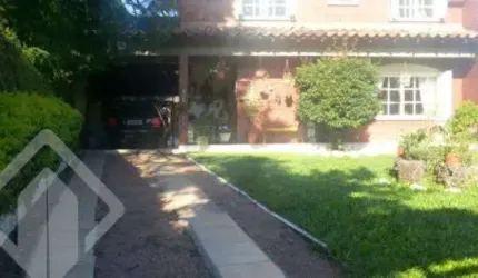 Casa em condomínio fechado com 3 quartos à venda na Rua dos Guenoas, 796, Guarujá, Porto Alegre, 300 m2 por R$ 1.080.000