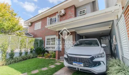 Casa com 3 quartos à venda na Rua Ivo Walter Kern, 320, Hípica, Porto Alegre, 133 m2 por R$ 740.000
