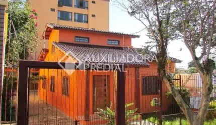 Casa em condomínio fechado com 3 quartos à venda na Rua Guiné, 486, Vila Ipiranga, Porto Alegre, 170 m2 por R$ 858.600