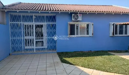 Casa em condomínio fechado com 3 quartos à venda na Rua Carlos Gomes, 215, Harmonia, Canoas, 110 m2 por R$ 600.000
