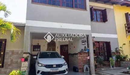 Casa em condomínio fechado com 3 quartos à venda na Rua Ponciano Pacheco da Silveira, 172, Guarujá, Porto Alegre, 167 m2 por R$ 470.000