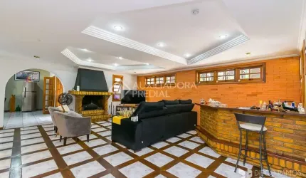 Casa em condomínio fechado com 3 quartos à venda na Rua dos Minuanos, 285, Espírito Santo, Porto Alegre, 291 m2 por R$ 1.100.000