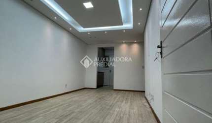 Casa em condomínio fechado com 2 quartos à venda na Rua Oscar Schick, 2350, Formoza, Alvorada, 66 m2 por R$ 280.000
