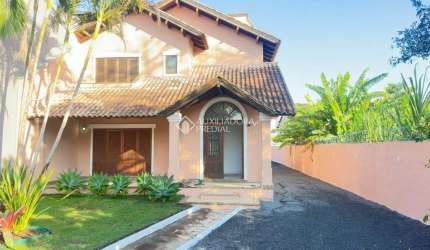 Casa com 5 quartos à venda na Rua Atílio Supertti, 87, Vila Nova, Porto Alegre, 283 m2 por R$ 1.810.000