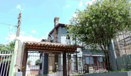 Casa em condomínio fechado com 5 quartos à venda na Rua Carajá, 213, Vila Assunção, Porto Alegre, 525 m2 por R$ 1.700.000