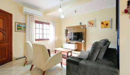 Casa com 3 quartos à venda na Avenida José Corrêa da Silva, 337, Cavalhada, Porto Alegre, 126 m2 por R$ 650.000
