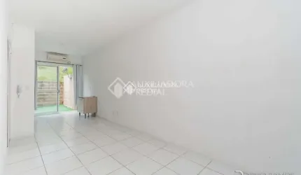 Casa em condomínio fechado com 2 quartos à venda na Estrada Caminho do Meio, 5701, Stella Maris, Alvorada, 51 m2 por R$ 210.000