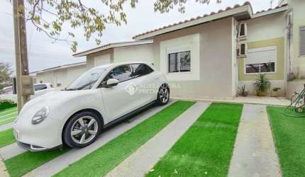 Casa em condomínio fechado com 2 quartos à venda na Acesso Terra Nova, 502, Terra Nova, Alvorada, 58 m2 por R$ 319.800