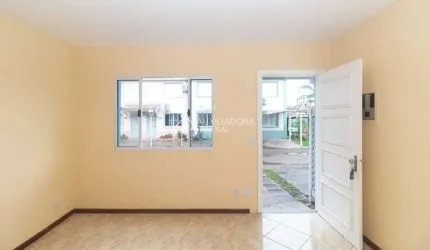 Casa em condomínio fechado com 3 quartos para alugar na Avenida José Aloísio Filho, 889, Humaitá, Porto Alegre, 120 m2 por R$ 1.900