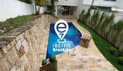 Casa de Condomínio de 425 m² com 4 suítes e 7 banheiros 4 vagas à Venda,