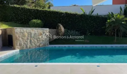 Casa em condomínio com 402 m² e 4 suítes
