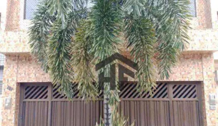 Casa de 2 andares, com 5 quartos sendo 2 suítes e área para eventos, localizada em Artur Lundgren I, Paulista - PE.  À Venda.