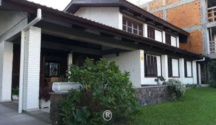 Casa 04 dormitórios venda Praia Grande Torres