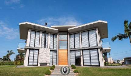 Casa 5 suítes a venda no Ocean Side em Torres