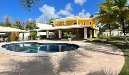 Excelente casa, pé na areia com 5/4, sendo 4 suítes a 60m da praia Busca Vida / Camaçari BA
