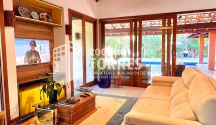Casa a venda de 4 suítes, com SISTEMA ENERGIA SOLAR, área gourmet com churrasqueira e piscina e 3 garagens na Praia do Forte  - Bahia