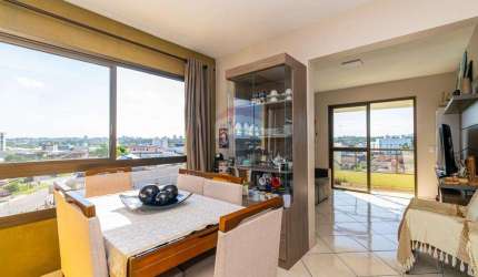 Apartamento mobiliado com dois dormitórios, sacada e churrasqueira