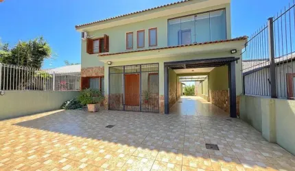 Casa com 6 dormitórios à venda, 344 m² por R$ 1.350.000,00 - Tristeza - Porto Al