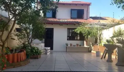 Casa com 4 dormitórios à venda, 245 m² por R$ 880.000,00 - Cavalhada - Porto Ale
