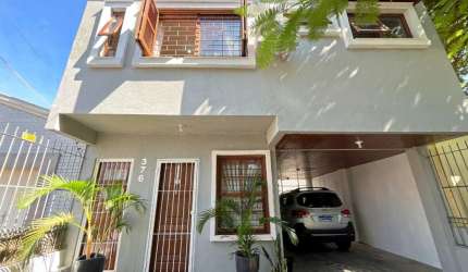 Casa em condomínio fechado com 4 quartos à venda na Rua Coronel Jaime da Costa Pereira, 376, Partenon, Porto Alegre, 180 m2 por R$ 980.000