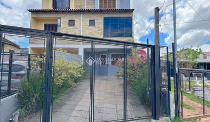 Casa com 3 quartos à venda na Rua dos Carijós, 324, Espírito Santo, Porto Alegre, 187 m2 por R$ 699.000