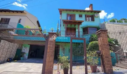 Casa com 3 quartos à venda na Rua Doutor Francisco de Sá Brito, 240, Partenon, Porto Alegre, 266 m2 por R$ 1.100.000