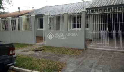 Casa em condomínio fechado com 3 quartos à venda na Rua das Araucárias, 1090, Harmonia, Canoas, 115 m2 por R$ 700.000