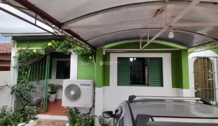 Casa com 2 quartos à venda na Rua Dos Quero Queros, 524, Jardim Algarve, Alvorada, 94 m2 por R$ 280.000