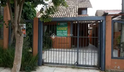 Casa com 3 quartos à venda na Rua Corujas, 635, Jardim Algarve, Alvorada, 120 m2 por R$ 400.000
