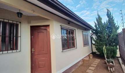 Casa com 2 quartos à venda na Rua Canários, 1232, Jardim Algarve, Alvorada, 68 m2 por R$ 324.900