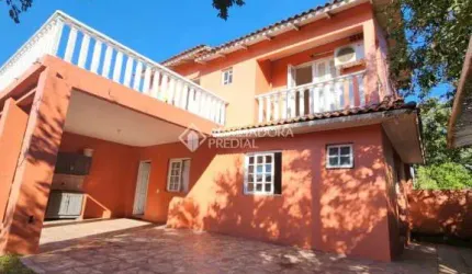 Casa com 2 quartos à venda na Rua Águias, 382, Jardim Algarve, Alvorada, 110 m2 por R$ 390.000